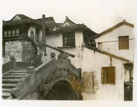 [View of bridge and historic buildings]