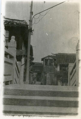 [View of historic architecture over bridge]